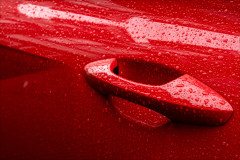 Red_car_in_the_rain